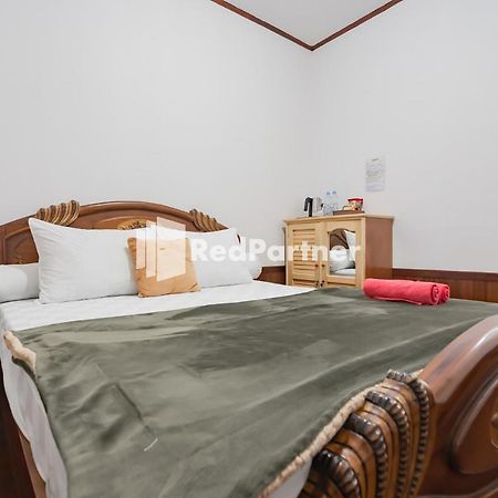 Langkar Guest House Syariah Mitra Reddoorz Samarinda Exterior photo