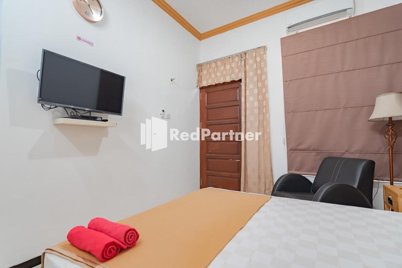 Langkar Guest House Syariah Mitra Reddoorz Samarinda Exterior photo